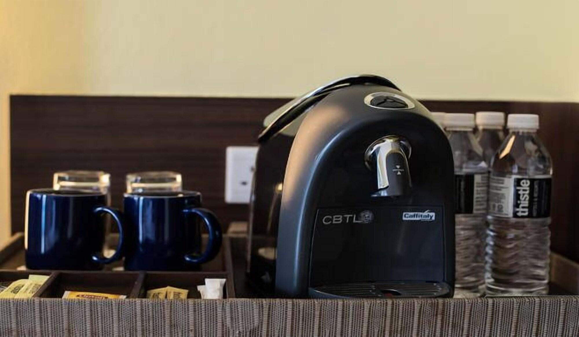Thistle Port Dickson Resort Buitenkant foto A coffee roaster